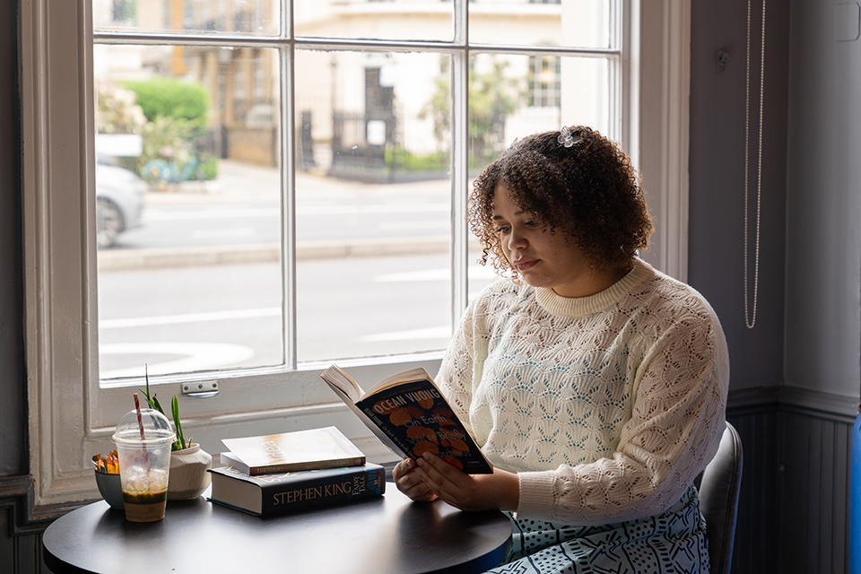 International Student Reading in The Thirsty Scholar at ISH London