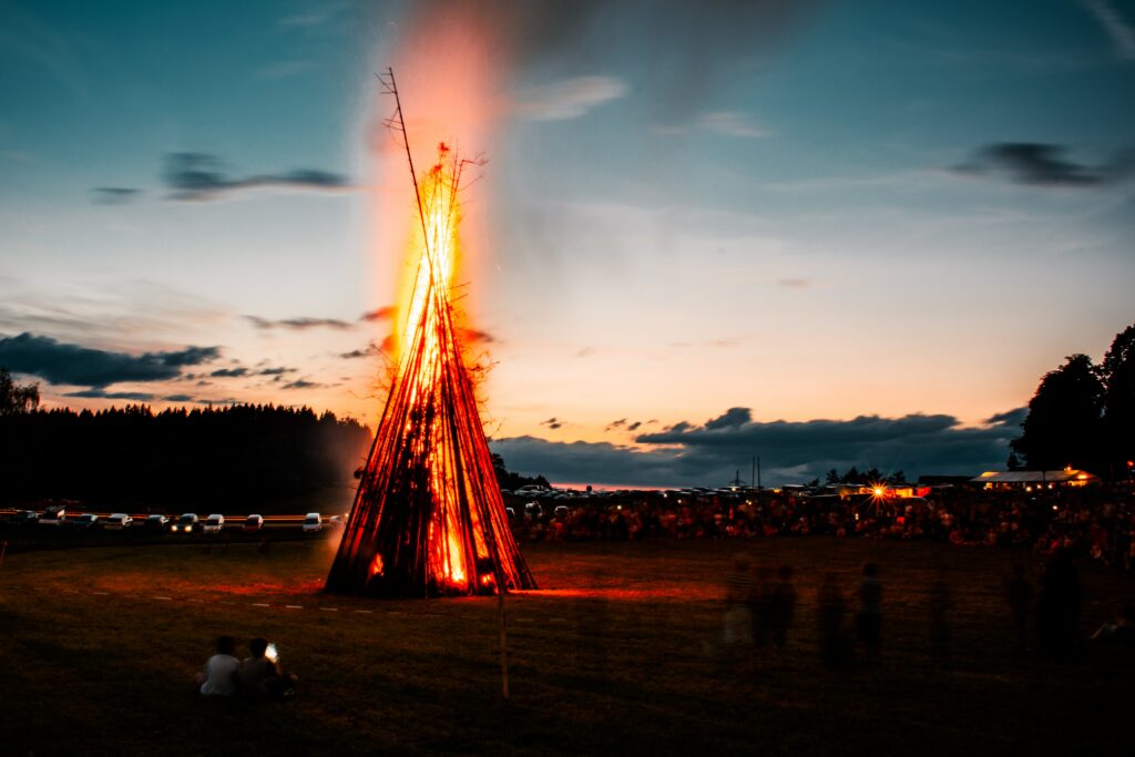 A bonfire in the middle of a beach