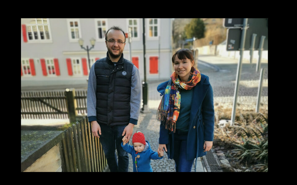 Julia Marie and Andrei with their daughter Ella