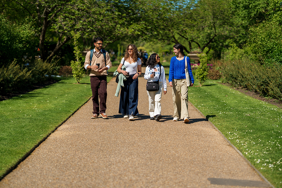 international students walking in Regents Park, seeing if future accommodation should be as nearby as international students house is