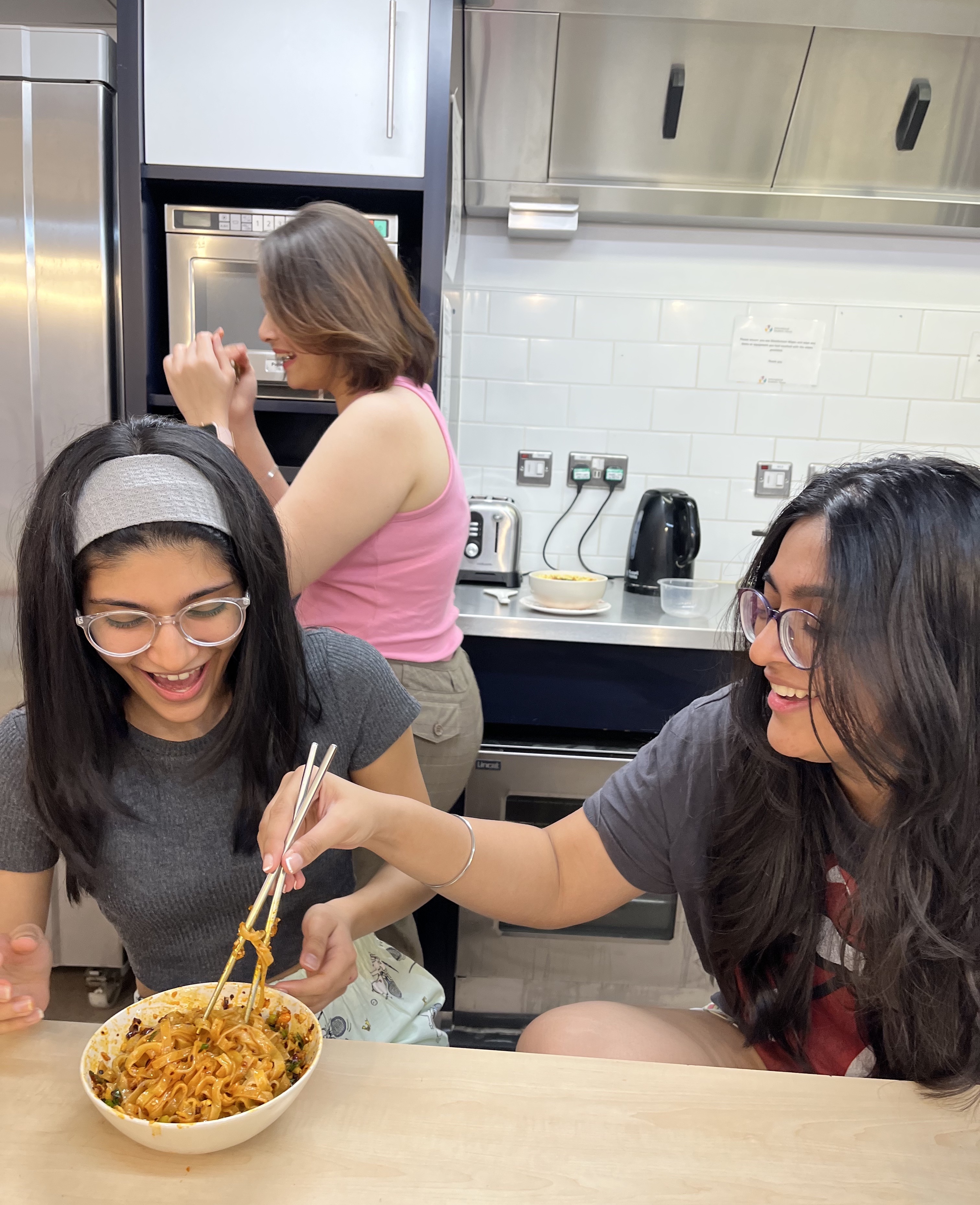 residents/friends enjoying their ramen