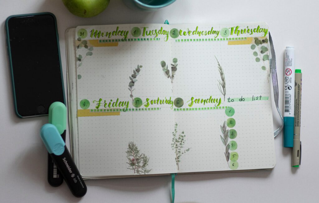 A planner with the days of the week inside of it