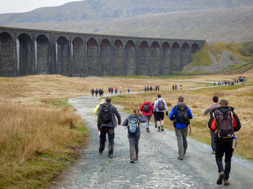 People walking towards a bridge in Yorkshire 