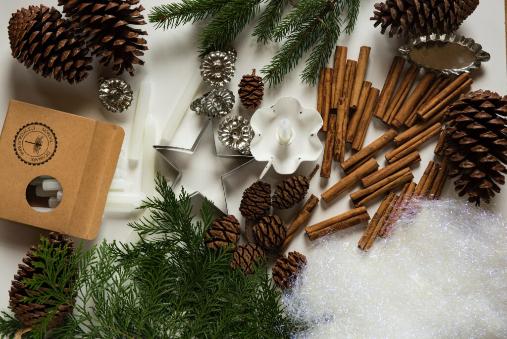 Pinecones and fake leaves on the table 