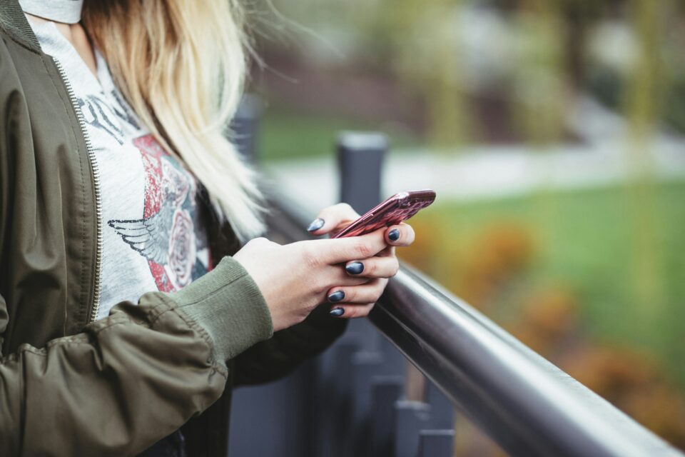 A girl holding her phone