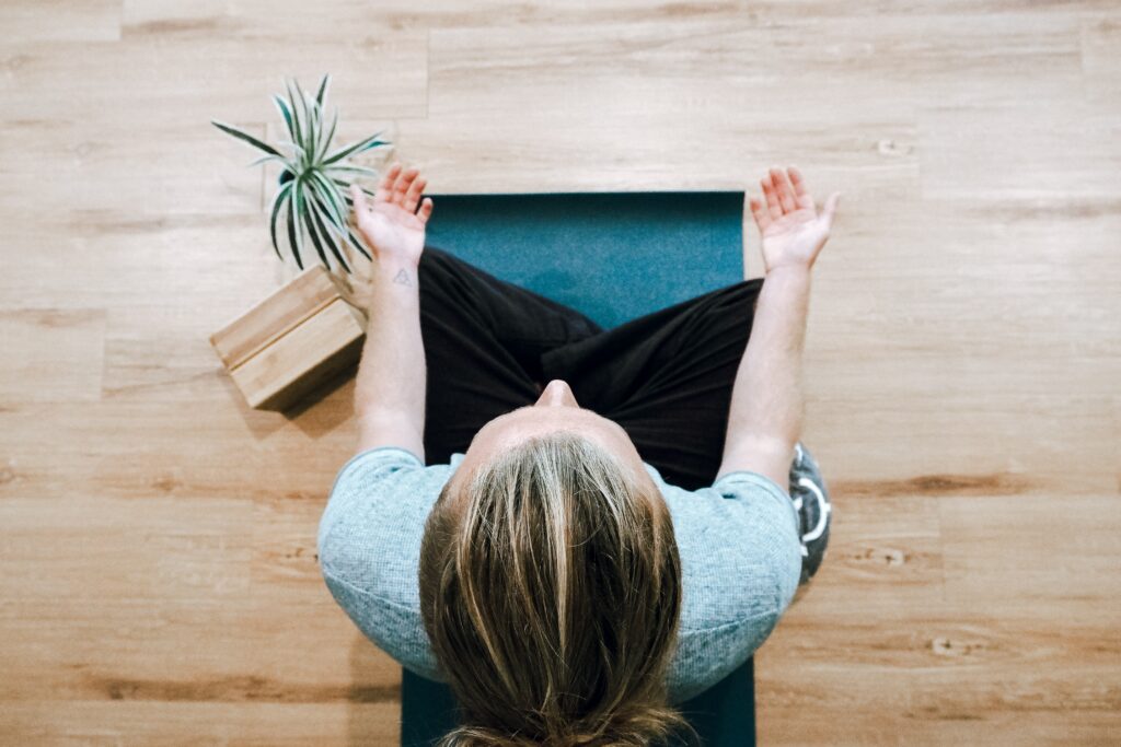 A woman doing Yoga/Meditating 