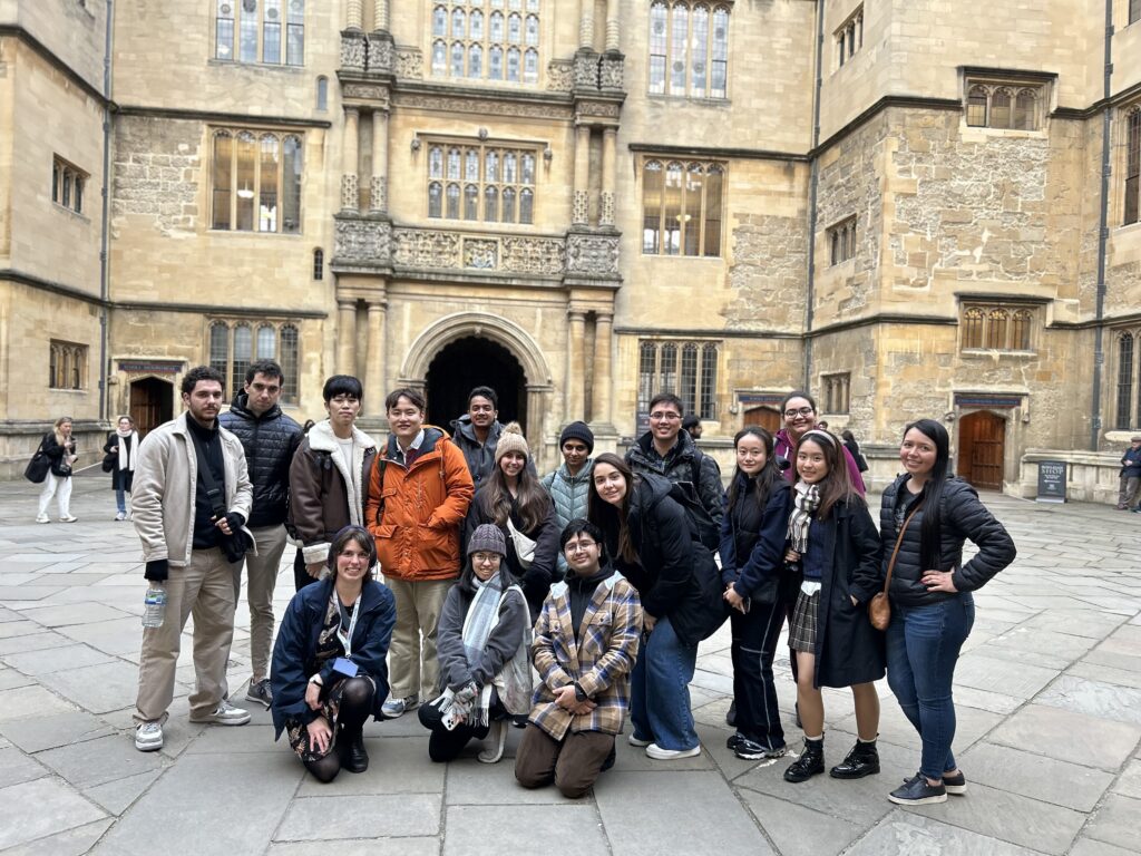 A group photo in front of a building 