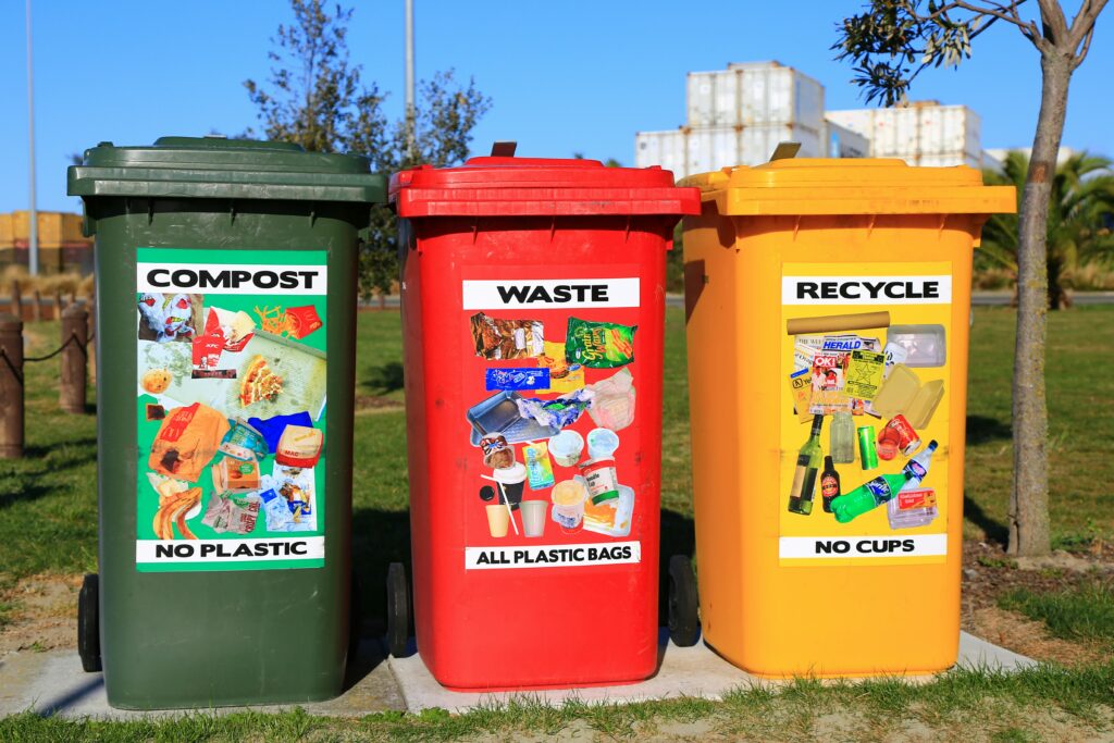 Three bins labelled compost, waste and recycle