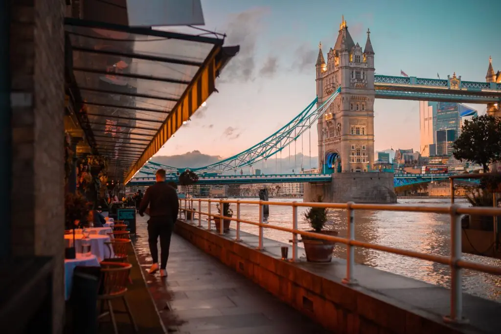 A view of Tower Bridge and the city of London from the riverside restaurant at sunset or sunrise