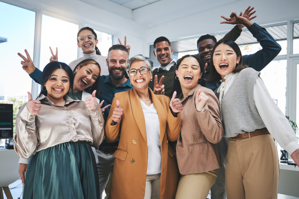 Business people, group celebration and wow, success and peace sign, thumbs up or emoji in team buil.