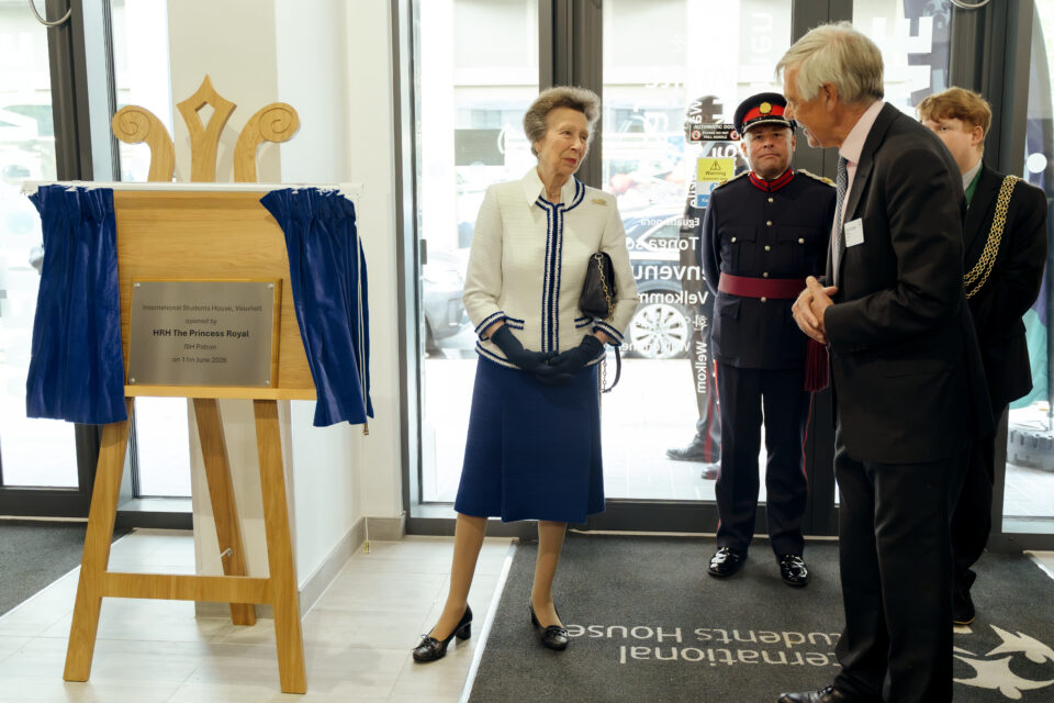 – international students house hrh princess anne standing next to plaque at the opening of international students house in vauxhall