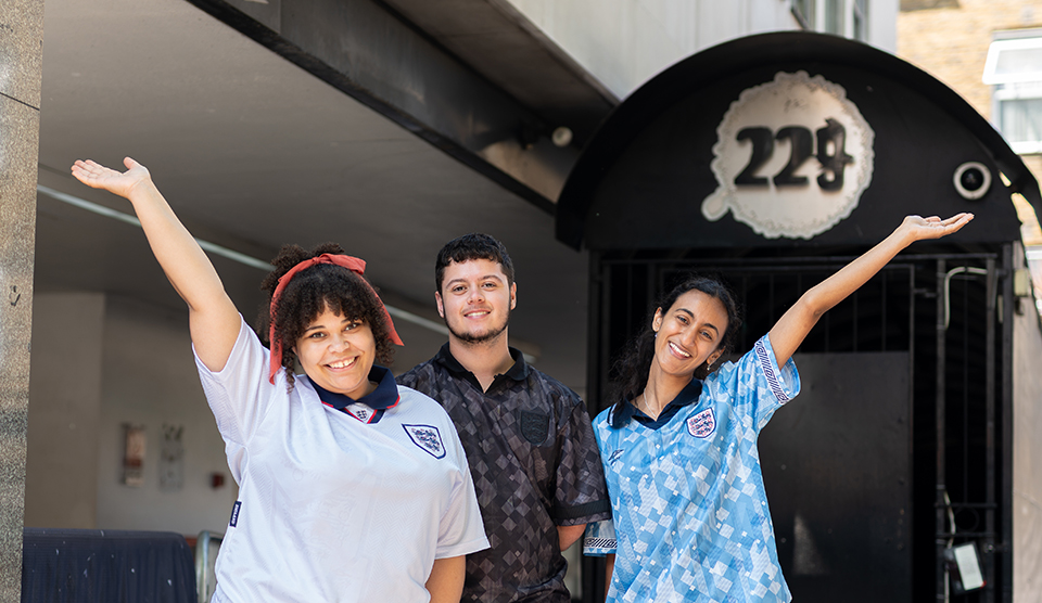 – international students house ish staff and former resident in their england shirts, ready for the world cup football semifinals