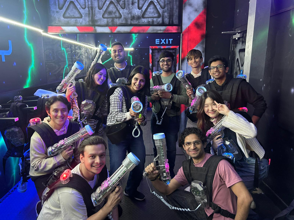 Out_with_friends – International Students House – international students house a group of students holding lasertags